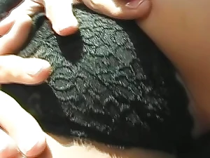 She is playing with her hairy pussy in car